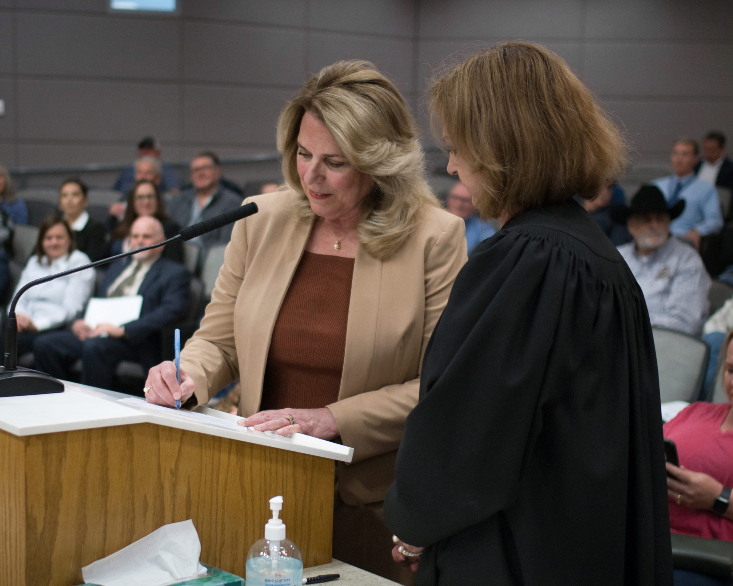 Commissioner Andriola being sworn in.