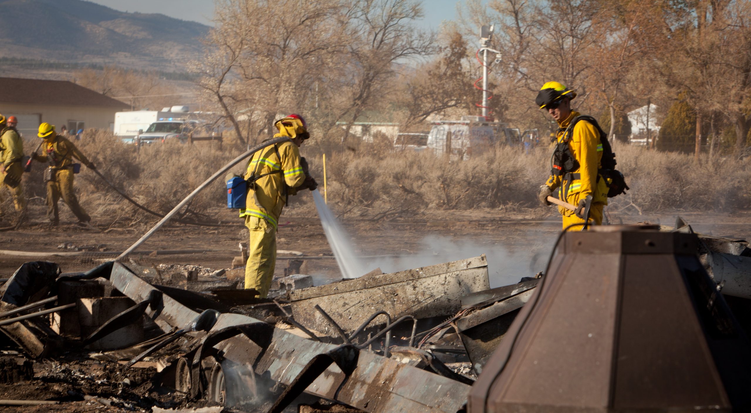 Fire fighters put out a fire.