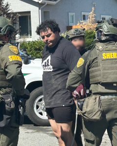 Photo of suspecting being arrested by WCSO SWAT deputies. 