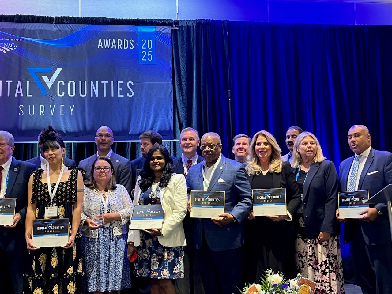 Image of people holding awards