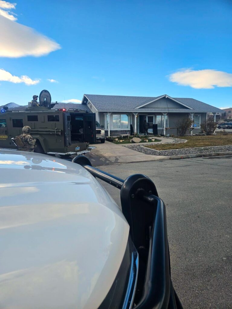 Residence with Swat Vehicle on street