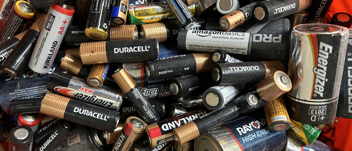 Photo of used batteries in a bucket