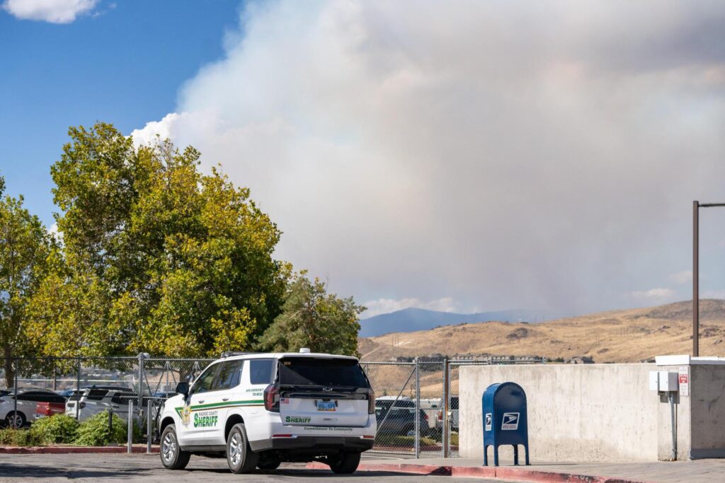 WCSO Patrol Car, smoke in background.