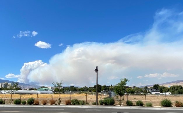 fire smoke into the blue sky.