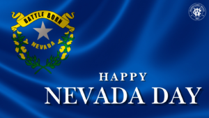 Image of the Nevada flag with "Happy Nevada Day"